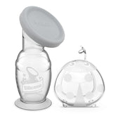 Haakaa 100ml manual breast pump with suction base catching let-down while nursing