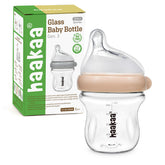 Haakaa Gen.3 natural glass bottle with wide neck for easy cleaning and filling.