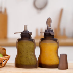 Haakaa reusable baby food pouch with detachable parts for easy cleaning.