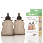haakaa yummy pouch hand-holding shows easy self-feeding and mess reduction on outings.