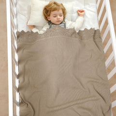 Hadetoto baby blanket crochet pattern close-up highlights tactile detail appealing to baby's senses.