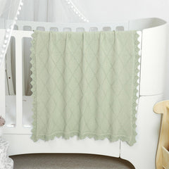 Hadetoto knit baby blanket used as a stroller cover for on the go protection
