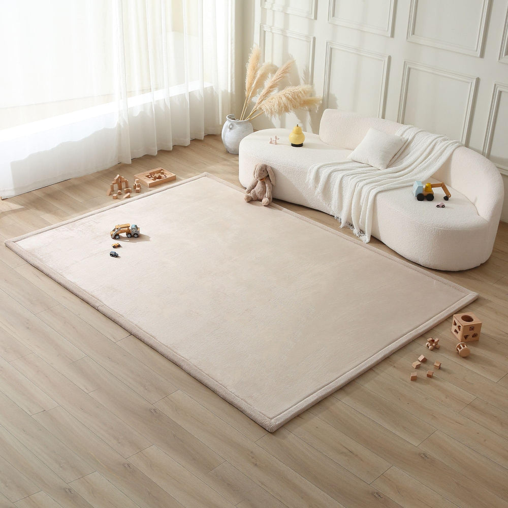 Hakuna Matte premium playmat top-down view in nursery showing spacious tummy-time area
