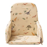 HALAA VAUVA baby high chair cover with dinosaur print on cream and pink; comfy dining and play.