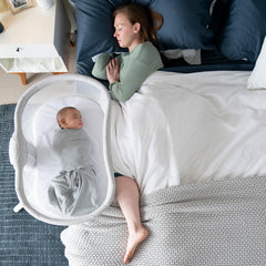 HALO BassiNest Swivel Sleeper 3.0 over-bed setup enables close, convenient nighttime care.