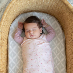 Halo Sleepsack Swaddle arms-in mode for secure swaddling.