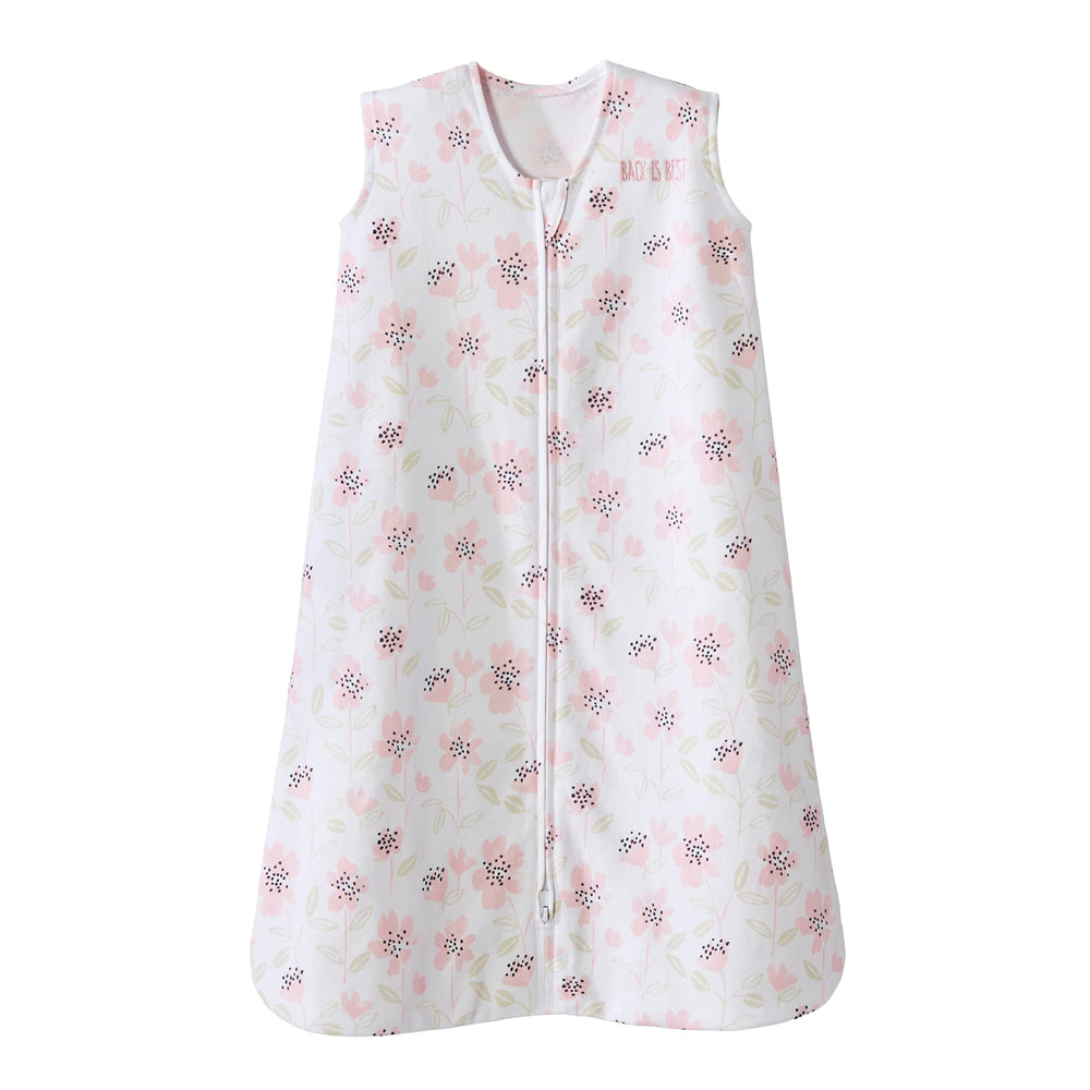 HALO SleepSack Wildflower Blush model wearing the cozy wearable blanket for safe sleep.