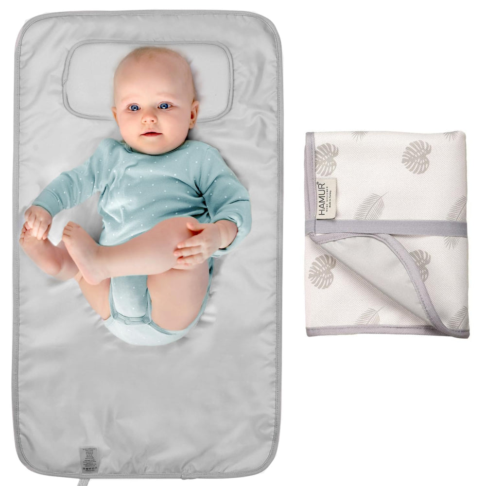 Hamur Home portable changing pad folded compact fits into a diaper bag for quick changes.