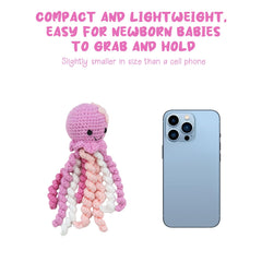 Handmade Crochet Octopus baby’s hands reaching image illustrating grasping practice and tactile stimulation
