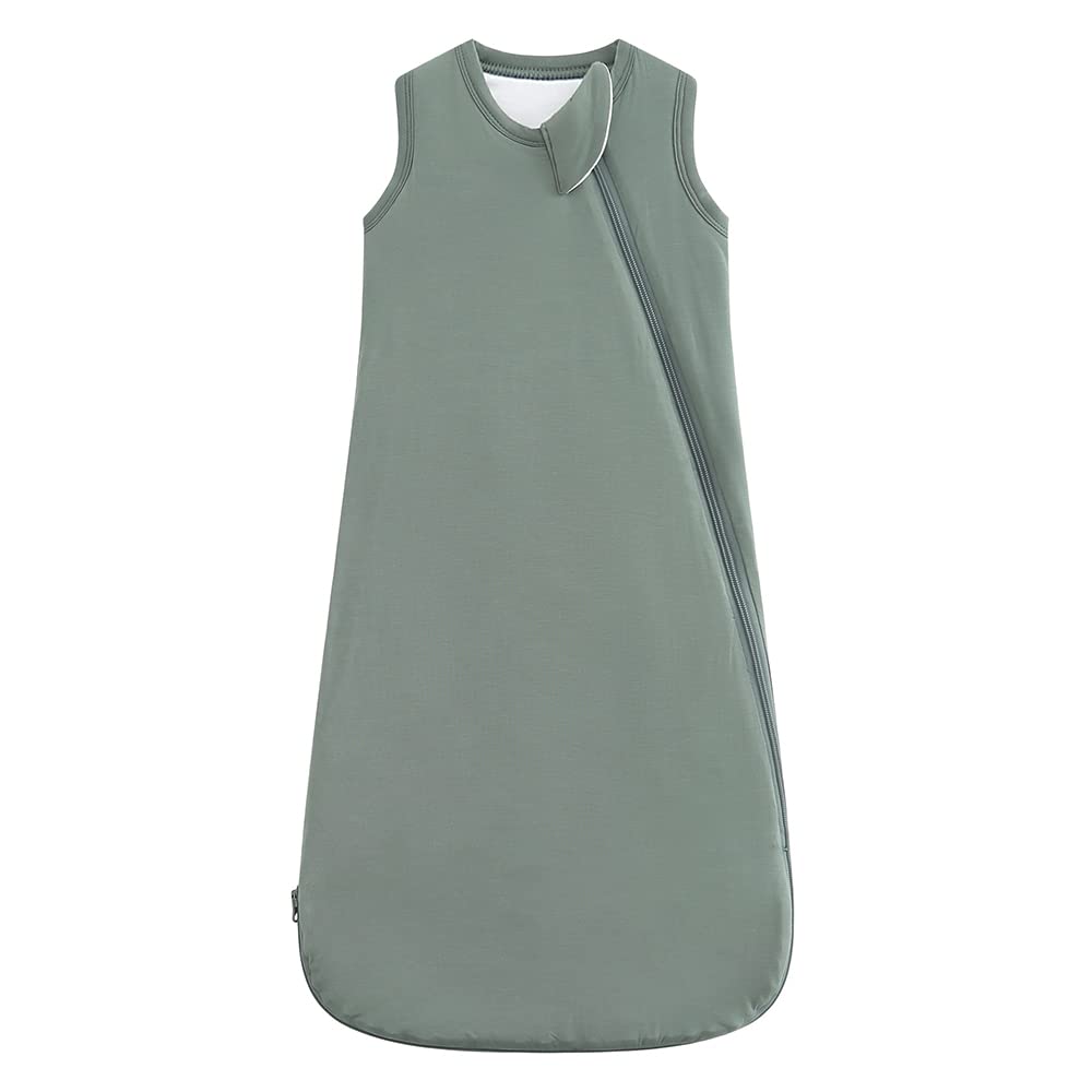 HAPIU bamboo sleep sack folded in forest green shows travel-ready compact design.