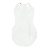 Happiest Baby Sleepea Comforter Swaddle in ivory demonstrates secure wrap for cozy sleep.