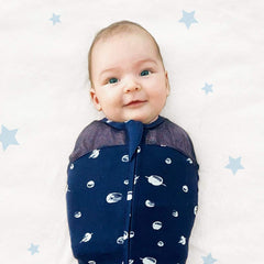 Happiest Baby Sleepea close-up highlights quiet Velcro for escape-proof security