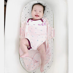 Happiest Baby SNOO Sleep Sack escape-proof Velcro keeps baby snug.
