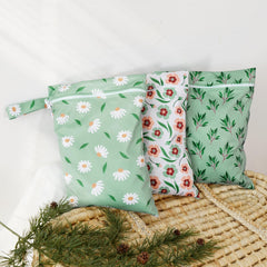 Happy Flute Daisy wet bag travel scene illustrating beach use and tidy organization