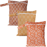 Happy Flute 3-set wet bags on display with travel-ready patterns
