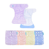 HappyFlute newborn-pocket diapers shown ready for on-the-go reuse.