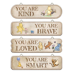 Hatzelou Winnie four-piece wooden sign set enhances nursery ambiance.