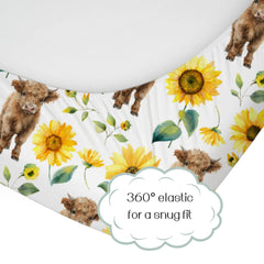 HawSkgFub Highland Cow Sunflower crib sheet closeup highlights soft, stretchy fabric.