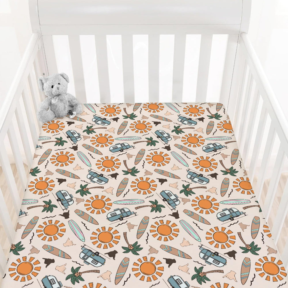 HawSkgFub hawaii-beach-surf-crib-sheet fits standard cribs securely with soft material.