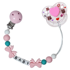 Helerkol pink cute pacifier clip with bowtie magnet secures reborn dolls during playful dressing.