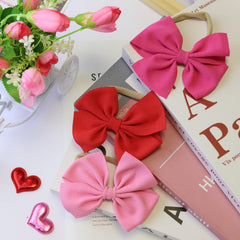 Hellykaka baby headbands worn as timeless newborn photo props.