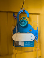HelperKat Pump Caddy Infinity Pump compatibility demonstrates secure fit with 500ml and 1000ml sets.