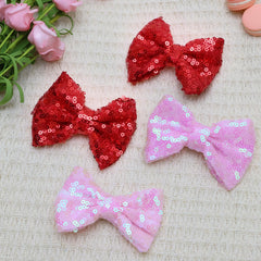HELYKAKA alligator-clip hair-bow demonstrating secure grip for kids.