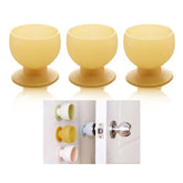 Hemiplegia yellow doorknob cover on knob reduces wall damage and noise