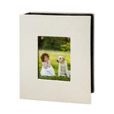HenPisen photo album with front window displaying a memory in beige cover