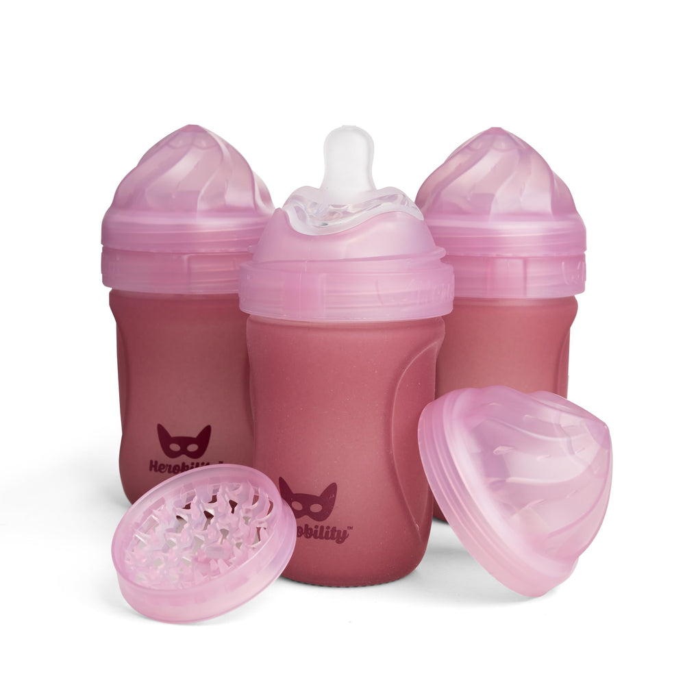 Herobility glass baby bottle rose front view with clear heat-sensing indicator for safe feeding.