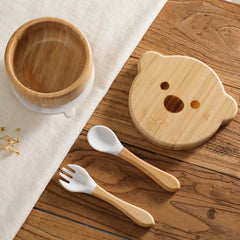 HI BABY MONMENT spoon set designed for tiny hands to encourage self-feeding.