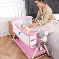 Hichangto Baby Bassinet pink side view showing bedside compatibility for nighttime care.