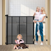 HIDOG 47-inch extra tall retractable gate fully assembled in doorway.