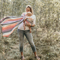 Hip Baby Wrap front tummy-to-tummy carry demonstrates ergonomic weight distribution