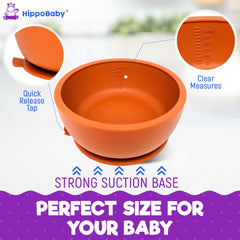 HippoBaby bib with pocket catches spills during feeding.