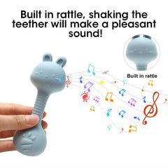 HippoBaby teether rattle in tiny hands demonstrates easy grip and independent exploration