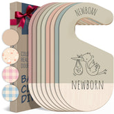 Hippotale baby clothes dividers on closet rail show organized sorting for newborn to toddler.