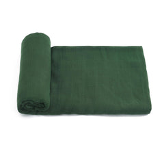Hollyoo muslin swaddle blanket green flatlay showcasing silky-soft bamboo viscose for newborn comfort