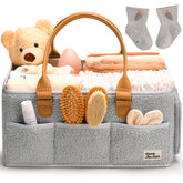 HOME FOR EACH diaper caddy with handle keeps nursery essentials within reach.