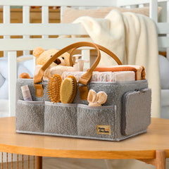 HOME FOR EACH stroller-ready diaper caddy keeps essentials within arm's reach on walks.