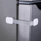 HomeBrella fridge lock adhesive in use secures doors for safety.