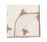 HomeyHues baby blanket close-up shows brown bear pattern and soft, breathable texture for cozy naps.