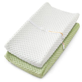 Homiest 2-pack changing pad cover in white and sage on a standard pad for easy daily diaper changes