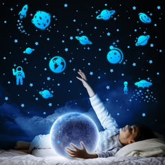 Honeyjoy solar-system-wall-decals-blue bring planets to life in a kid's room.