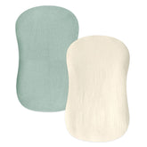 Hooyax baby lounger cover closeup in green wheat reveals breathable muslin cotton for newborn comfort.