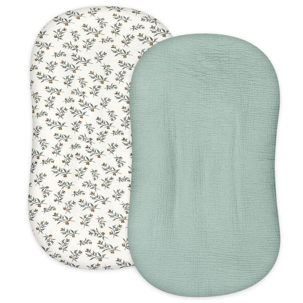 Hooyax Muslin Baby Lounger Cover light green close-up shows breathable muslin fabric for newborn comfort.