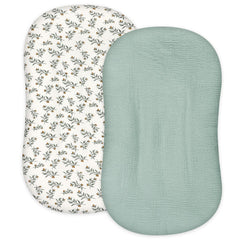 Hooyax Muslin Baby Lounger Cover light green close-up shows breathable muslin fabric for newborn comfort.