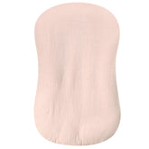 Hooyax Muslin Baby Lounger Cover light pink, front view, breathable comfort for delicate newborn skin.