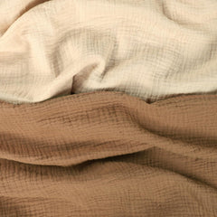 Hooyax Muslin Baby Lounger Cover texture close-up highlights soft weave for cooler rests.
