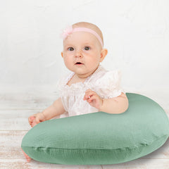 Hooyax muslin nursing pillow cover on pillow showcases breathable fabric for cooler feeding.